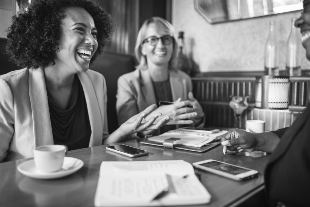 cheerful businesswomen relaxing at a cafe